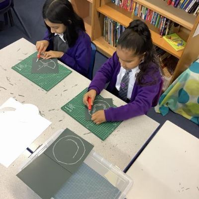 During Art, we have been carving lino, ready to make a repeating pattern print.