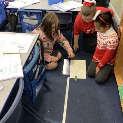 In Science, Year 5 have been investigating the effects different surfaces have on a travelling vehicle as part of their Forces unit.